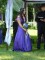 An unusual bride in lush purple silk gown with beaded details