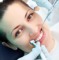 Woman patient at the dentist.